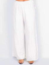 Knit trousers with width